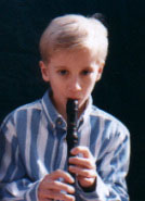 child playing soprano recorder
