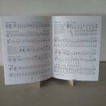 five-note book on easel 2